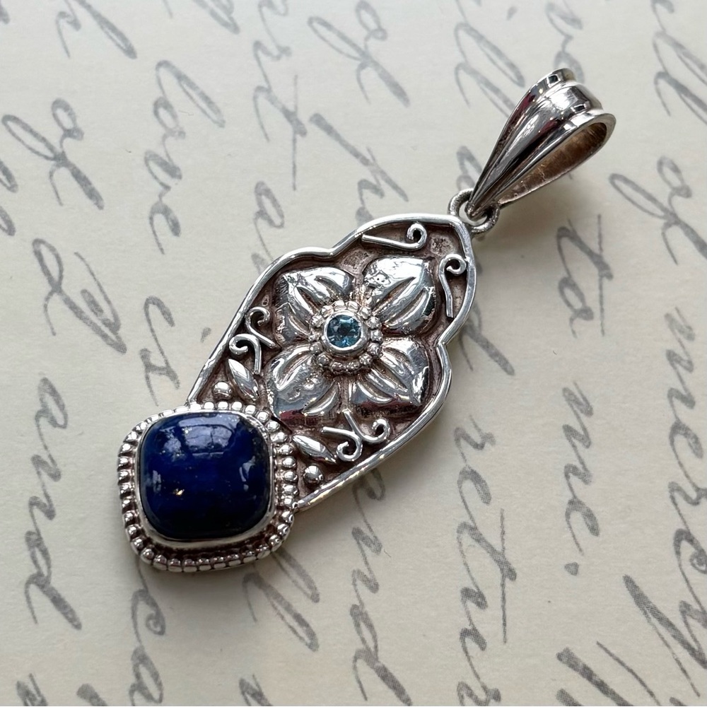 Elegant Silver and Blue Lapis Topaz Lotus Pendant